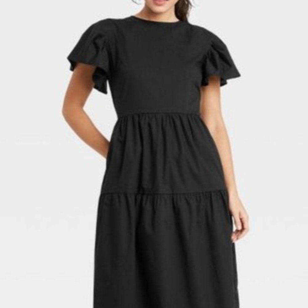Black ruffle dress